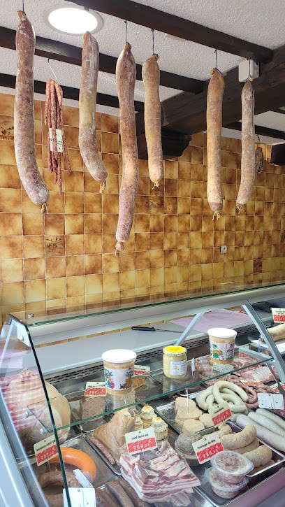 Charles Joël, Boucherie à Hargnies